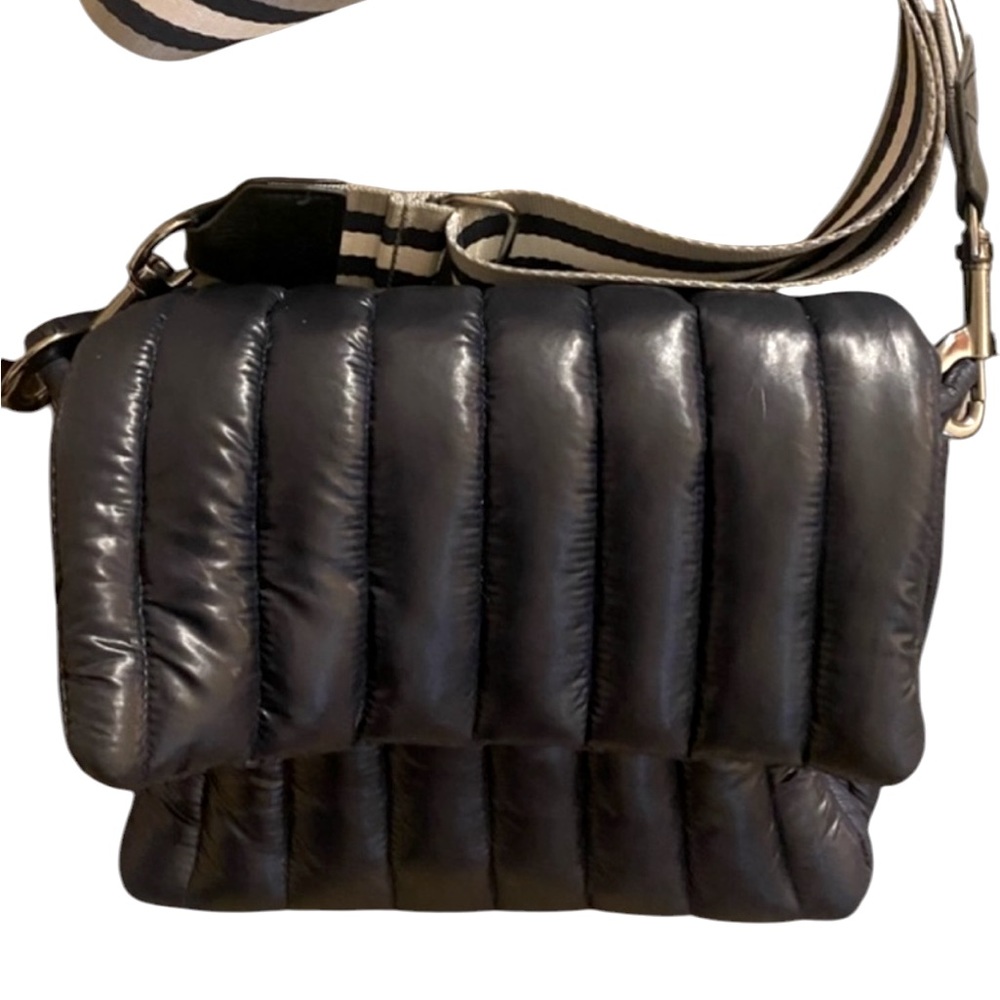 Think Royln Bar Bag. Adjustable Striped Strap defines this chic bag. Black